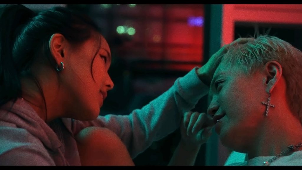 Bloo and actress staring at each other lovingly from BLOO's music video Drama.