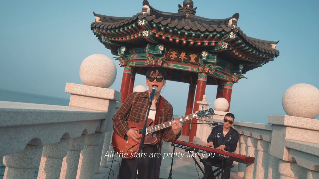 Singers oceanfromtheblue and Bumkey performing "Tina" English version live